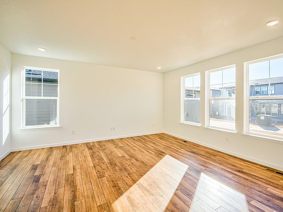 The gathering room is spacious and illuminated with plenty of natural light.