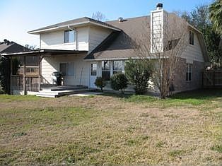 The back yard and view of the back of the house