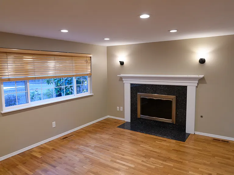 Living room with a view of Bowdoin and attractive fireplace.