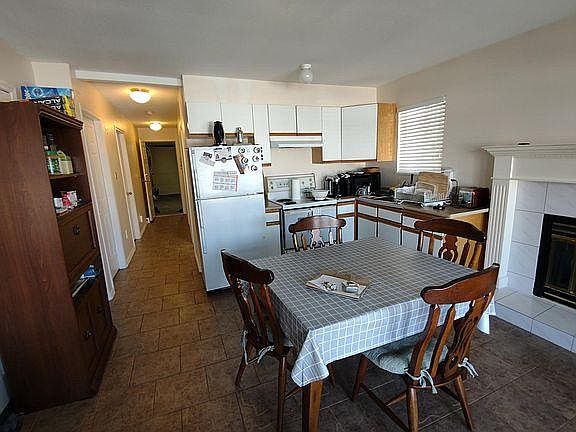 Dining , Kitchen, and the hallway leading to the garage.