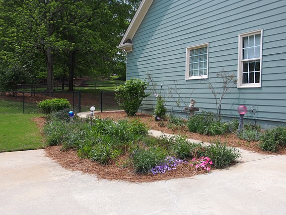 gardens surround the home