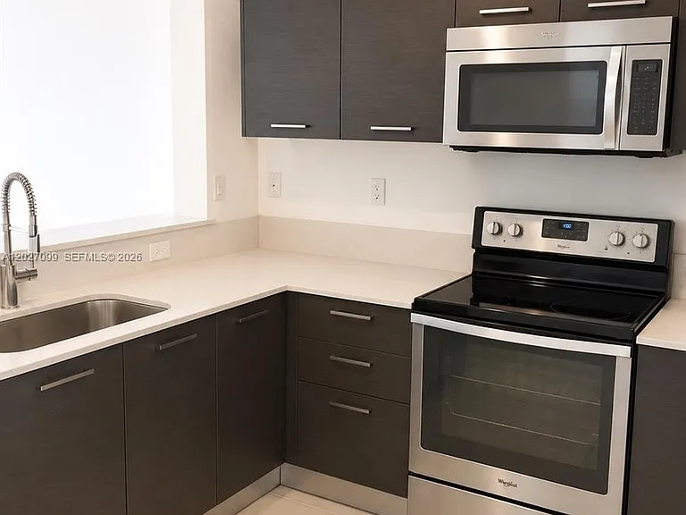 1370 NW 34th Way #1370 — Photo 1