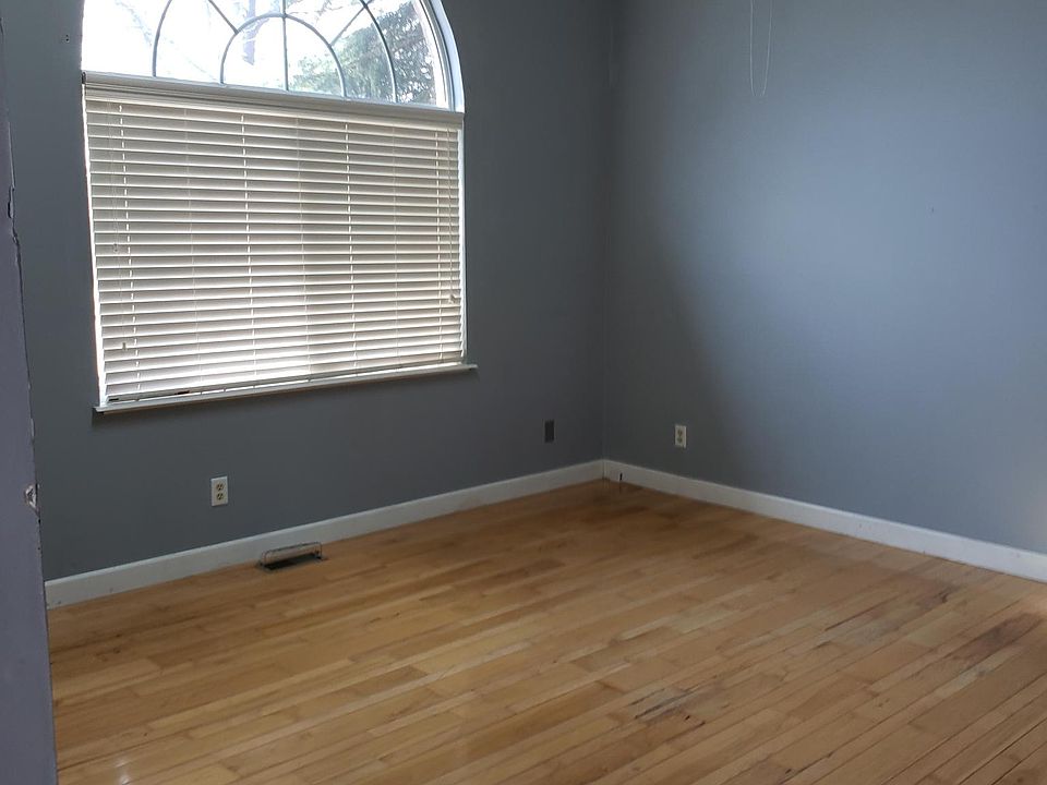 Front room with vaulted ceilings and skylight