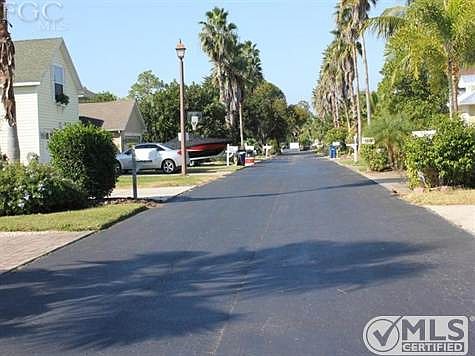 Facing land, looking down street to the right.