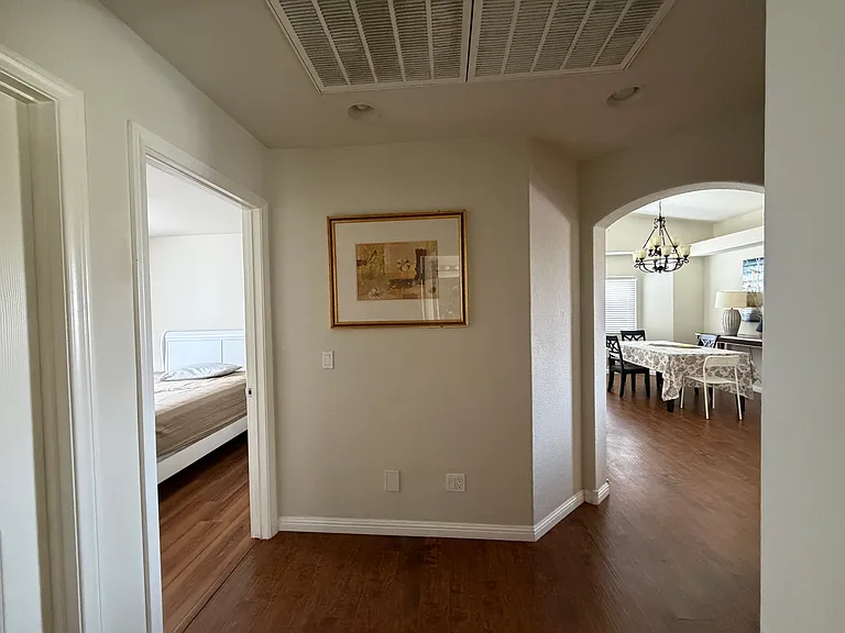 Bright second-floor hallway and shared living area