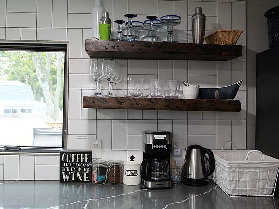 Quartz countertops & floating shelving