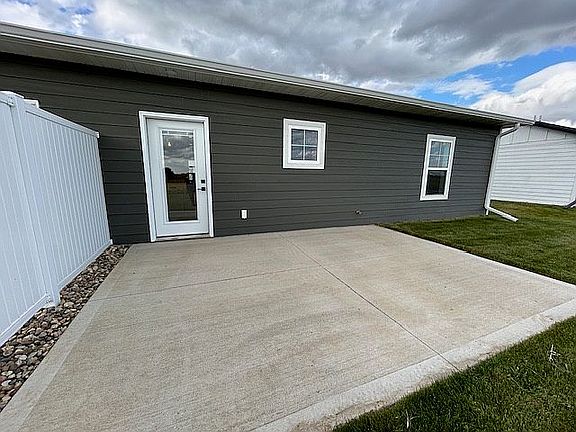 Back patio w/ privacy fence