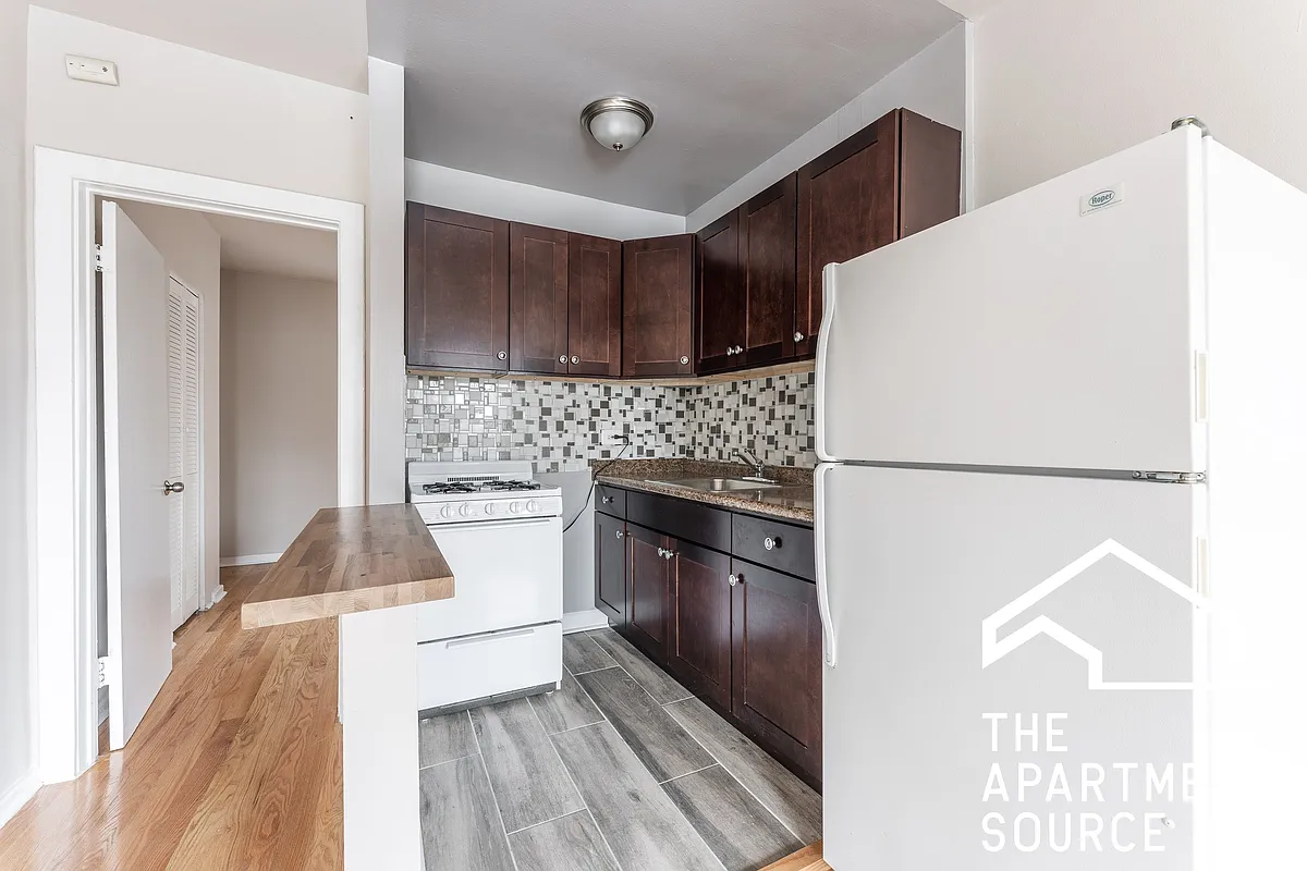 Building Photo - 5670 N Ridge Ave #1S
