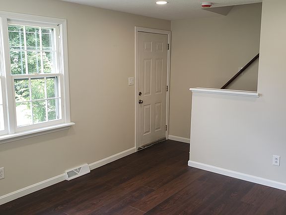 Living room facing stairs