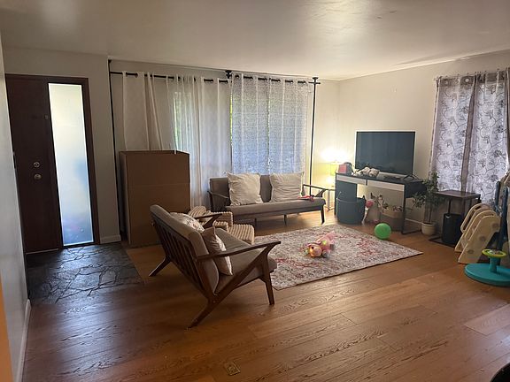 Living room boasts large windows