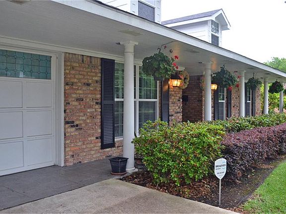 Enter on beautiful heavy-duty tile that extends to the front door and all the way through the garage.