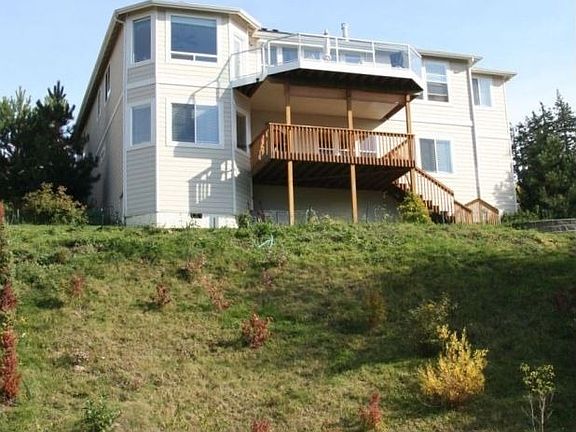 1/4 acre yard, part level/part slope