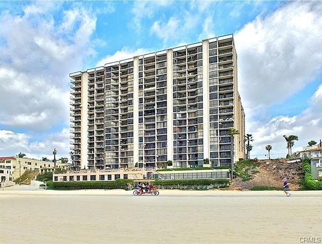 Front of Building from the sand/water