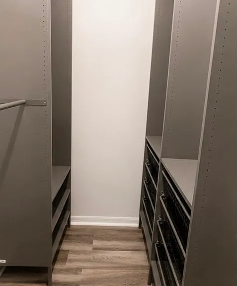 Custom walk-in closet organization system included.