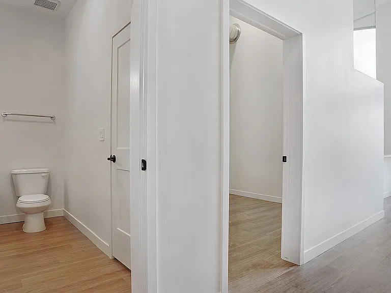 Clean lines and modern finishes define interior circulation spaces.