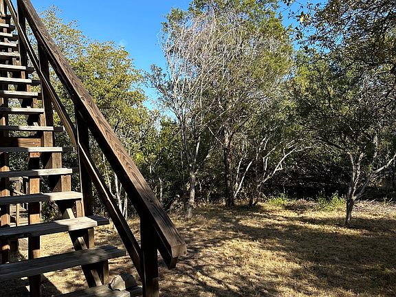 Side Yard and Exterior Stairs to Loft
