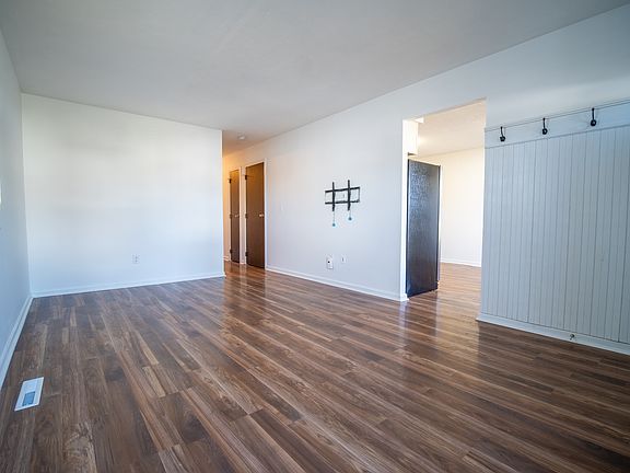 Comfortable living room is just inside the front door.
