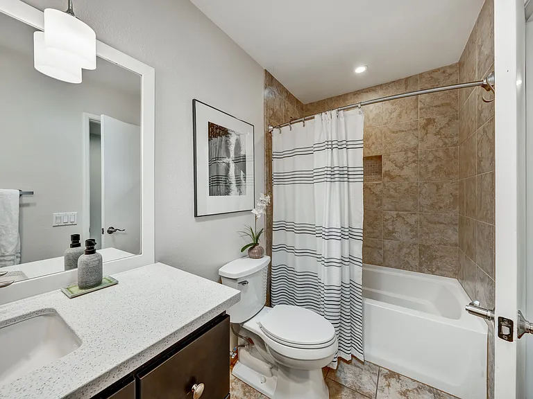 Hallway full-bathroom.
