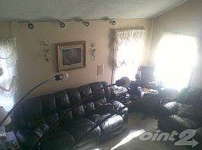 Family room with vaulted ceili