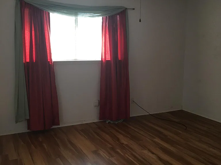 Master bedroom towards back of room