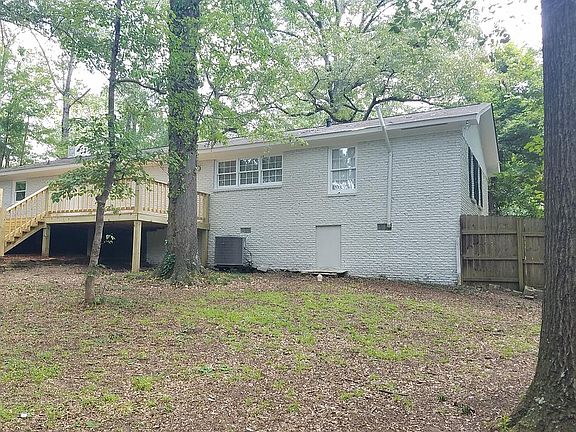 Large yard with mature trees