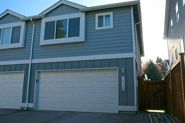 Large two car garage with lots of shelving. The driveway provides for additional guest parking.