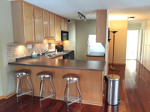 View from the dining area (room for a big table) towards kitchen and bedrooms down the hall.