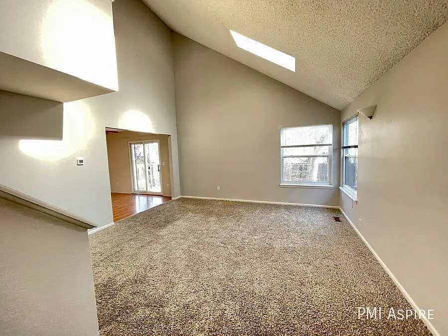 "Charming 4-Bed Sanctuary on Juniper Street Spacious 1625 Sq Ft Home in Longmont!" — Photo 2