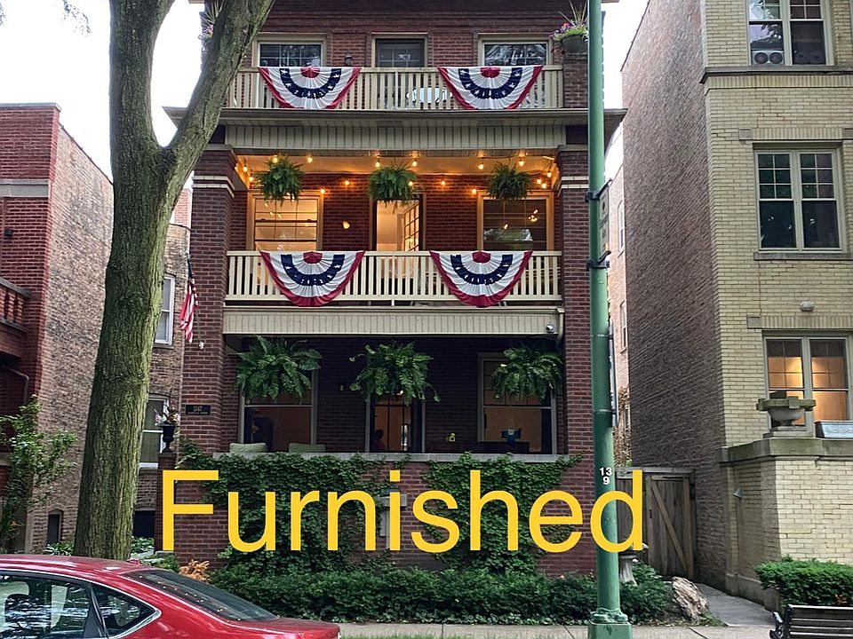 Private spacious balcony overlooking quiet tree-lined street.