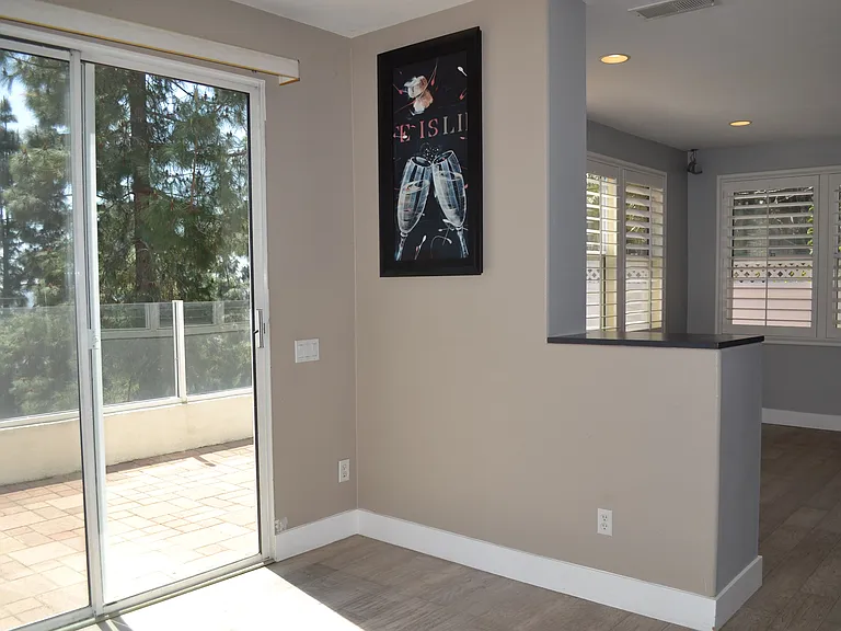 Dining area in the kitchen with sliding door that opens to patio
