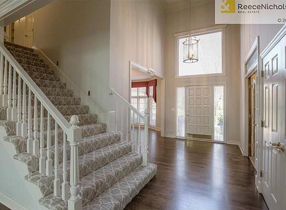 Brand new hardwood floors and staircase carpet. Handy step lighting for safety