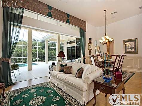 Front entry shows Formal Living Room and Pocket Doors to Large Lanai