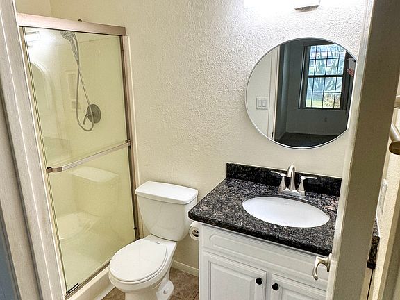 Primary on-suite full bathroom with walk-in shower.