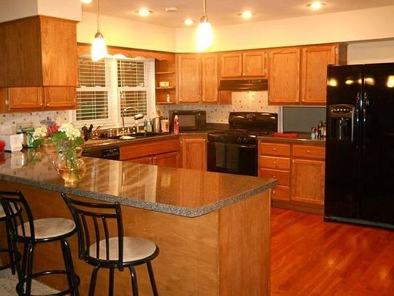 Dream kitchen. Loads of cabinets and counters.