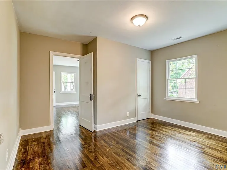 Middle bedroom- connects to the front facing bedroom. front facing bedroom can also be accessed through the living room.