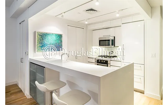 Sold by Douglas Elliman | media 18