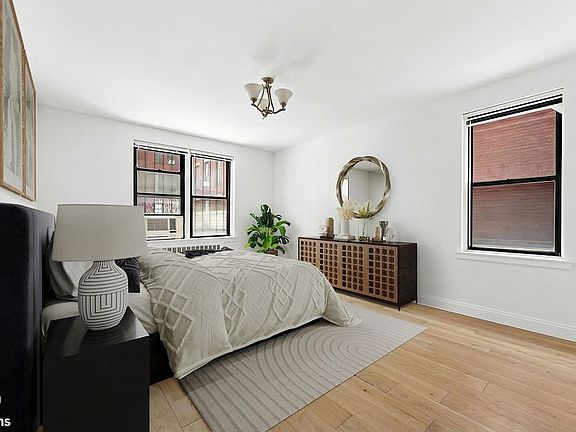 4th image of 50 E 8th St APT 1S