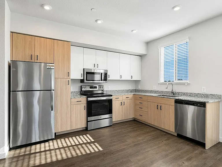 Experience the elegance of this sleek kitchen, perfect for culinary adventures at 805 Riverfront in Sacramento
