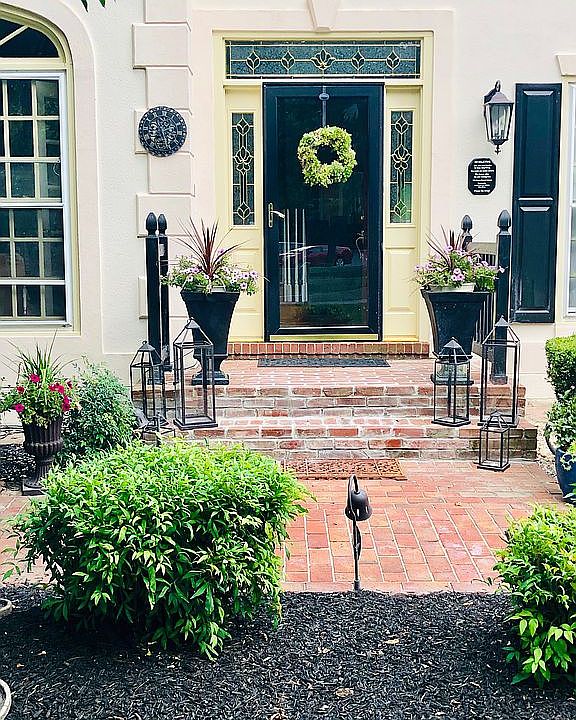 FRONT ENTRANCE WITH BRICK