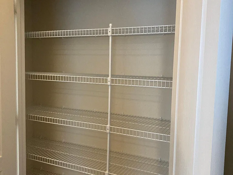 Extra-large linen closet in hallway