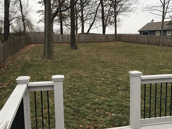 Deck to the fenced backyard