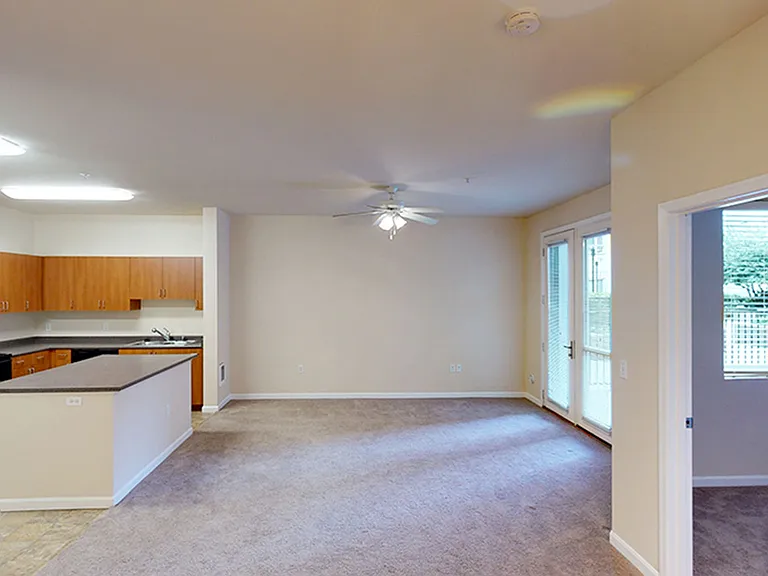 Griffis Lake Washington A6 kitchen with cherry cabinets and living room.