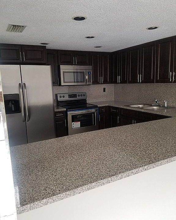 2nd image of 7090 W 3rd Ave