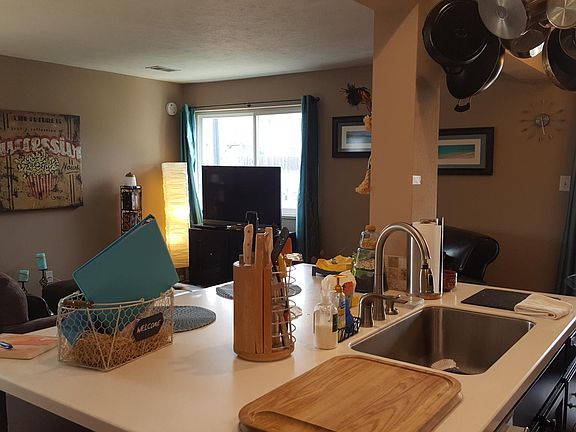 New Kitchen with Quartz Island and Bar Seating
