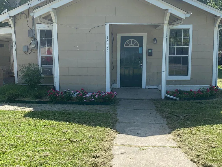 Front of house with landscaping