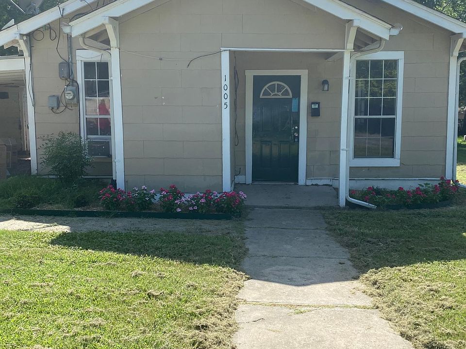 Front of house with landscaping