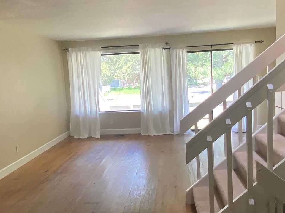 open living area with dining and wood floors