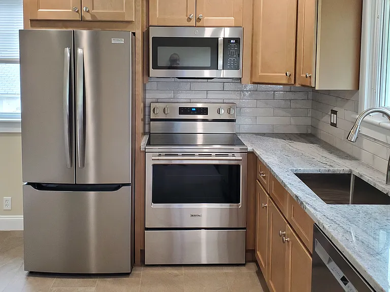 All new kitchen appliances - refrigerator, stove,microwave & dishwasher