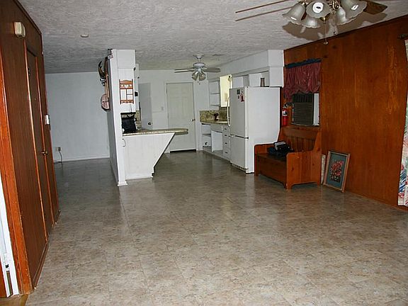 View across den to kitchen