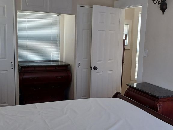 BEDROOM 2 WITH SLIDER TO THE FLAT''S HUGE PRIVATE DECK